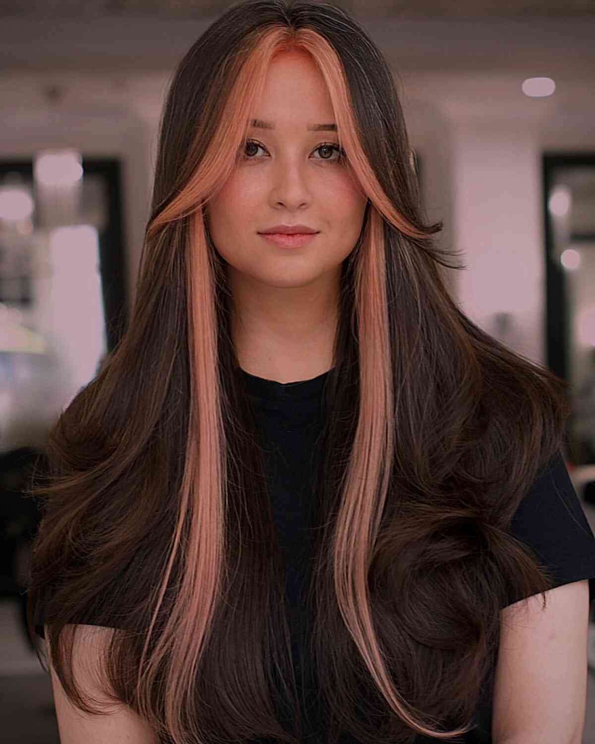 Pink money piece on dark long hair