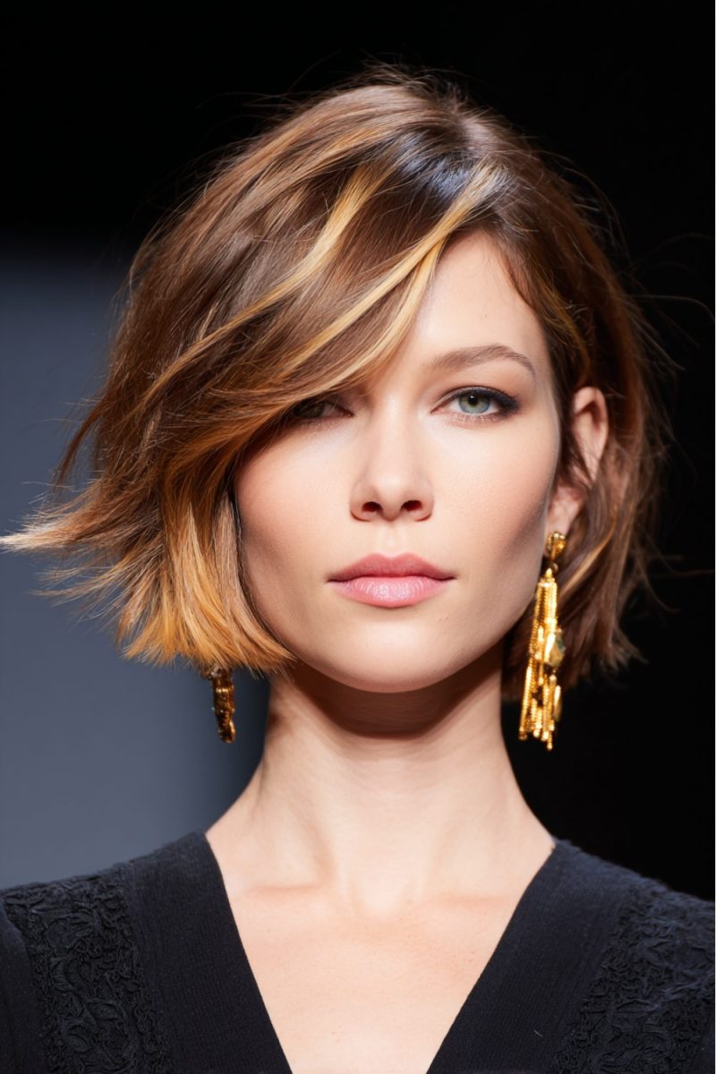 Sophisticated bob with auburn highlights