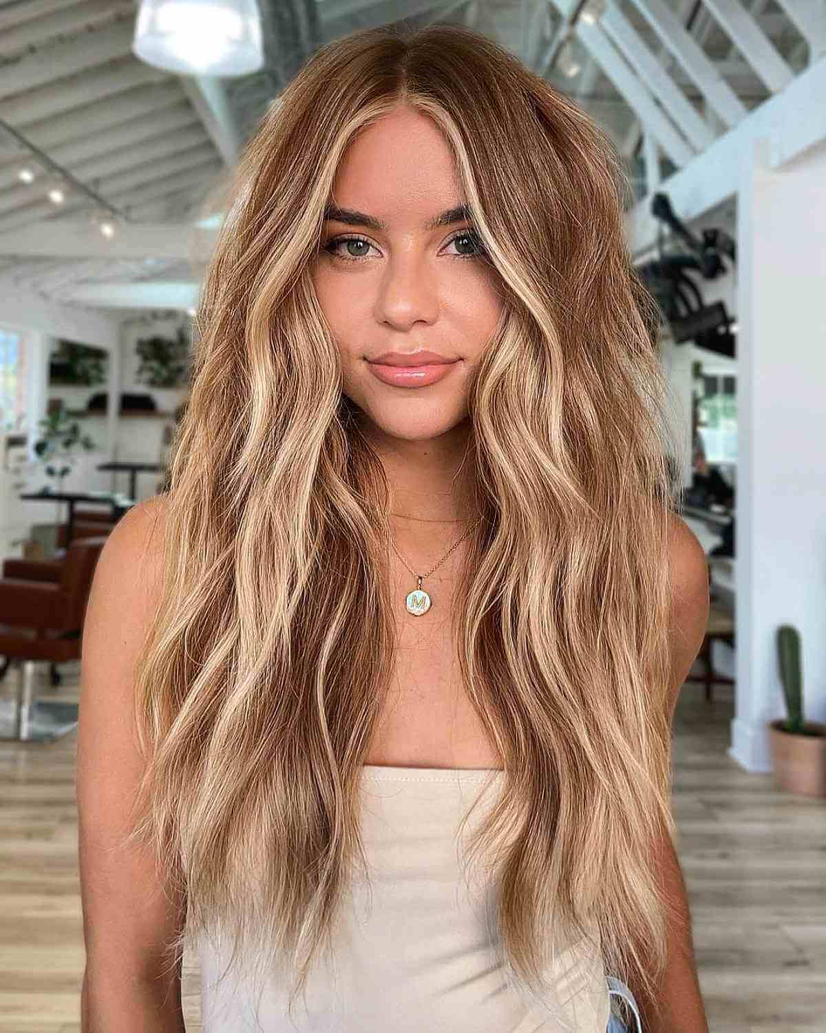 Beachy blonde waves with dimensional highlights