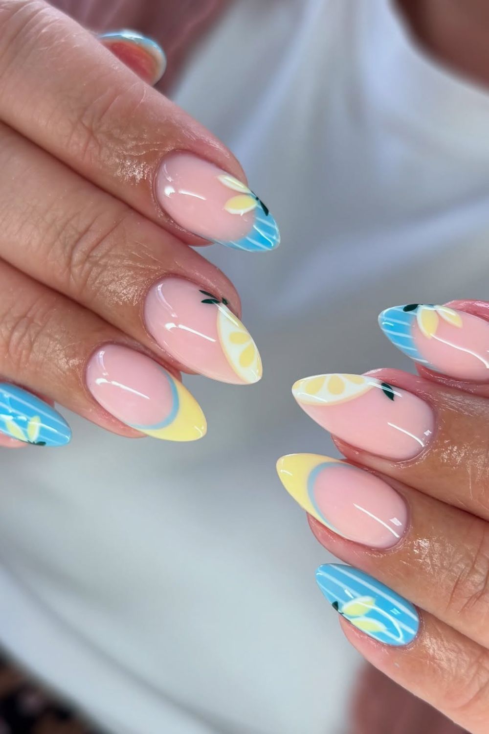 Tropical nail art with blue and yellow