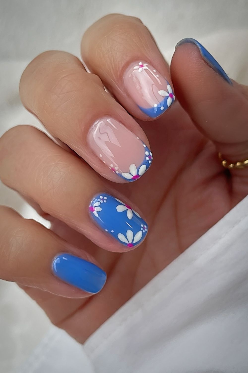 Blue and pink floral French nails