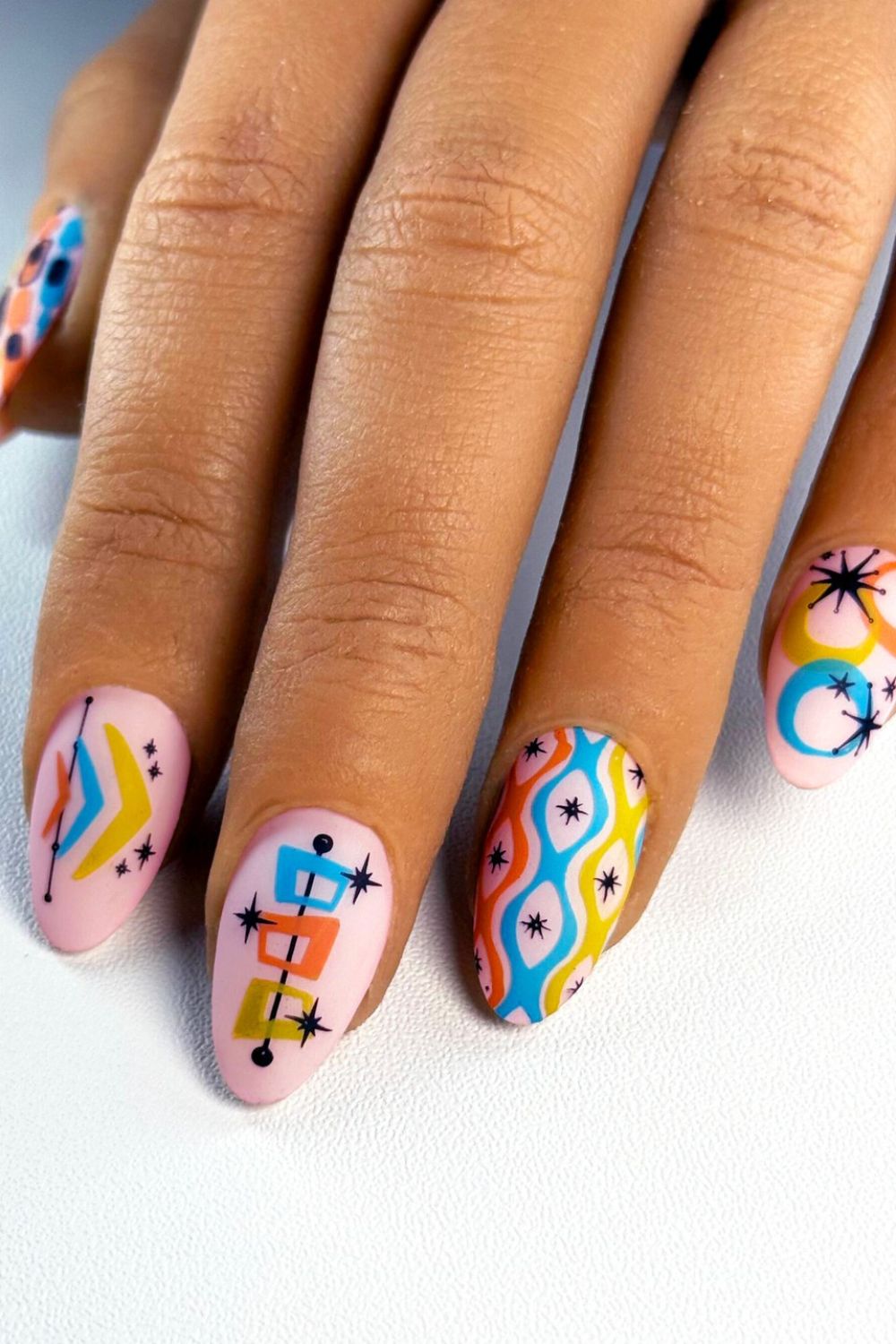 Colorful retro art nails, bold almond shape