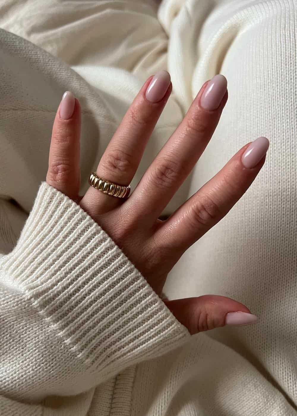 Nude almond nails, timeless and classic.