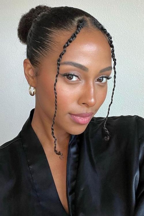 Sleek bun with front twists