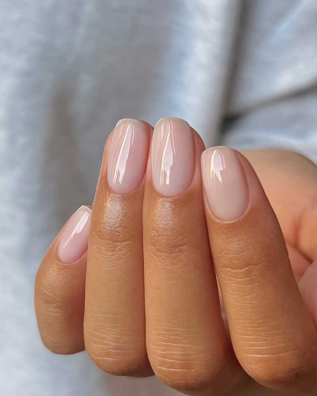 Glossy nude nails with natural finish