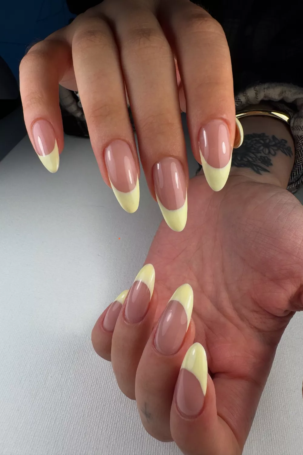 Yellow French tips with almond shape