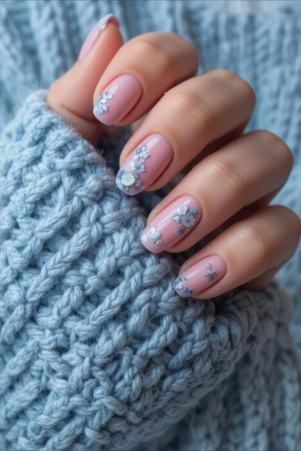 Pink nails with blue floral art