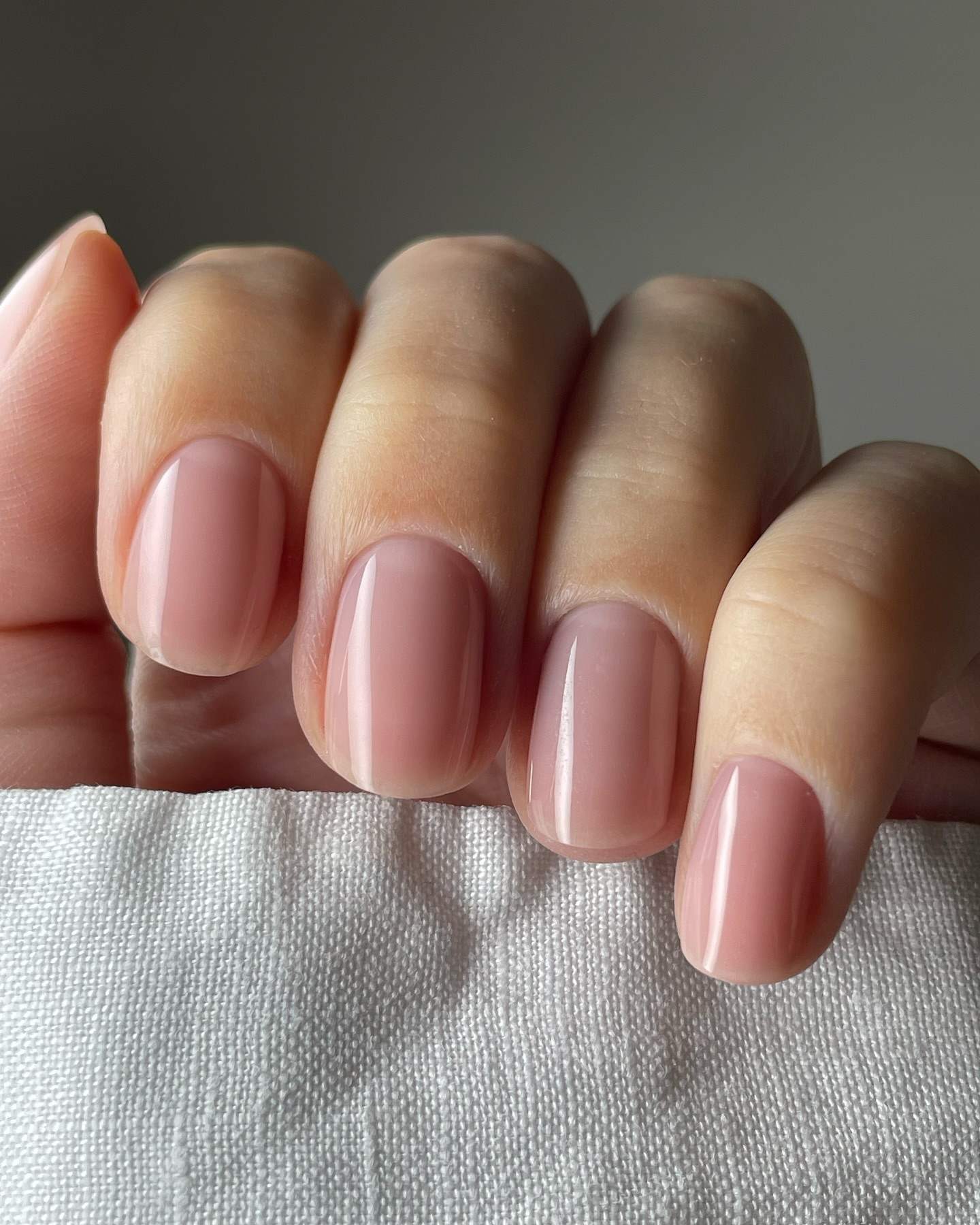 Soft nude nails with a glossy finish