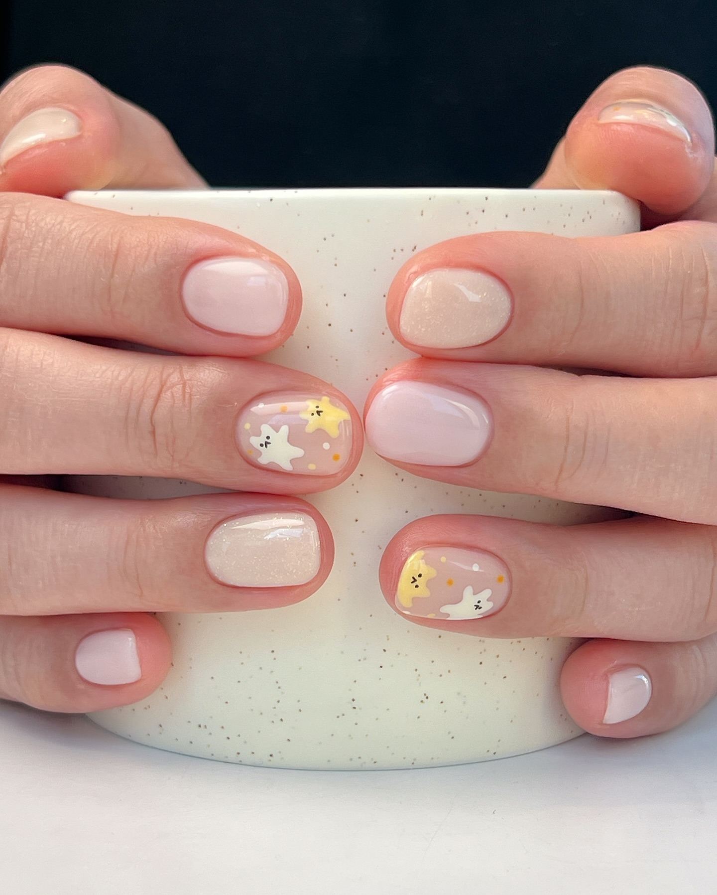 Short nails with celestial nail art