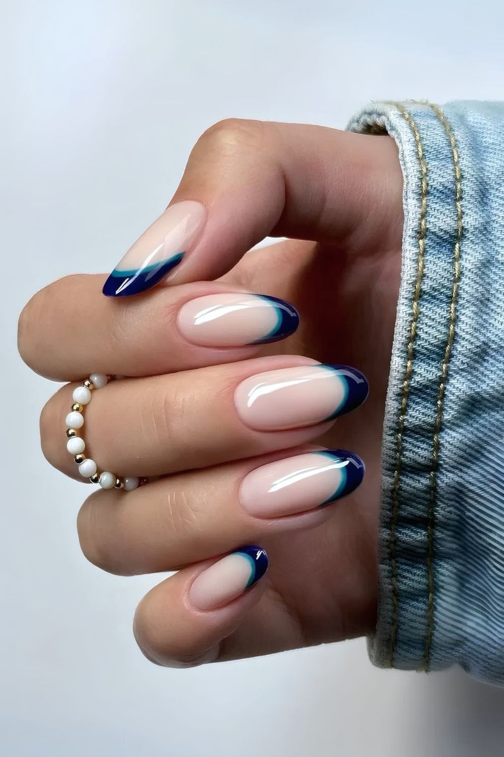 Navy French tips with a modern twist, elegant and chic.