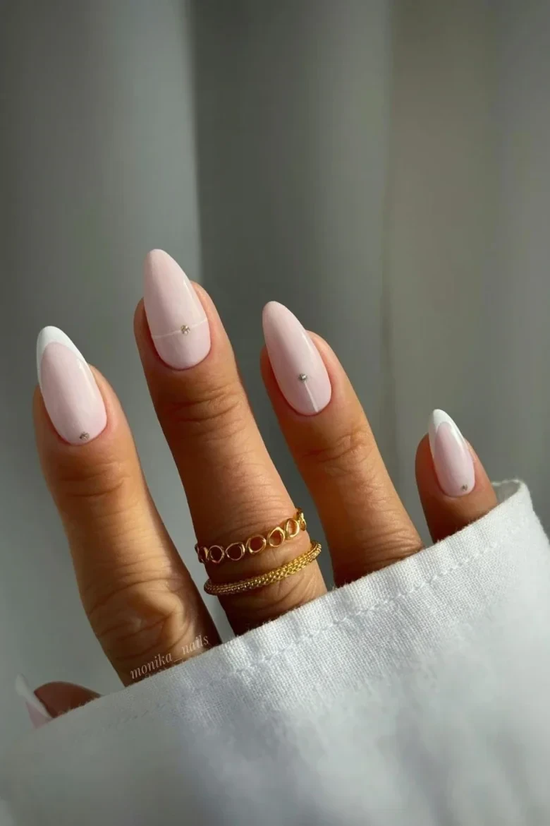 Minimalist French neutral nails, almond shape, subtle elegance