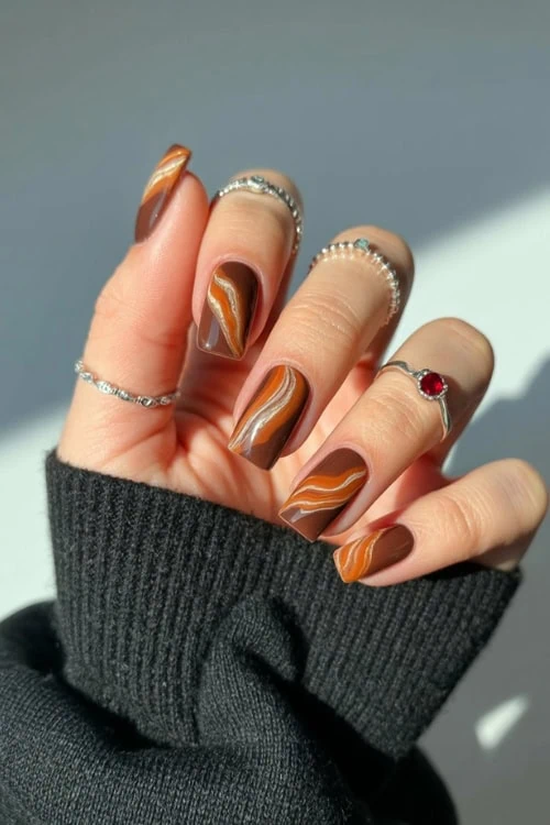 Earthy marble nails, square shape, artistic vibe