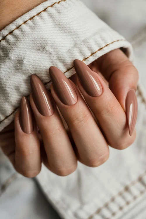 Mocha stiletto nails, dramatic and bold