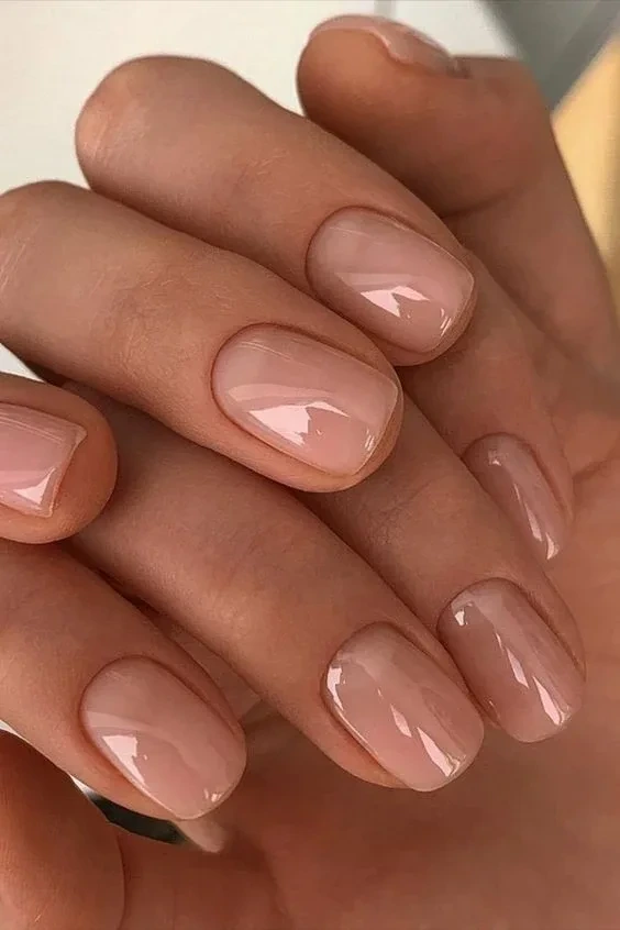 Glossy nude nails, short square shape, timeless style