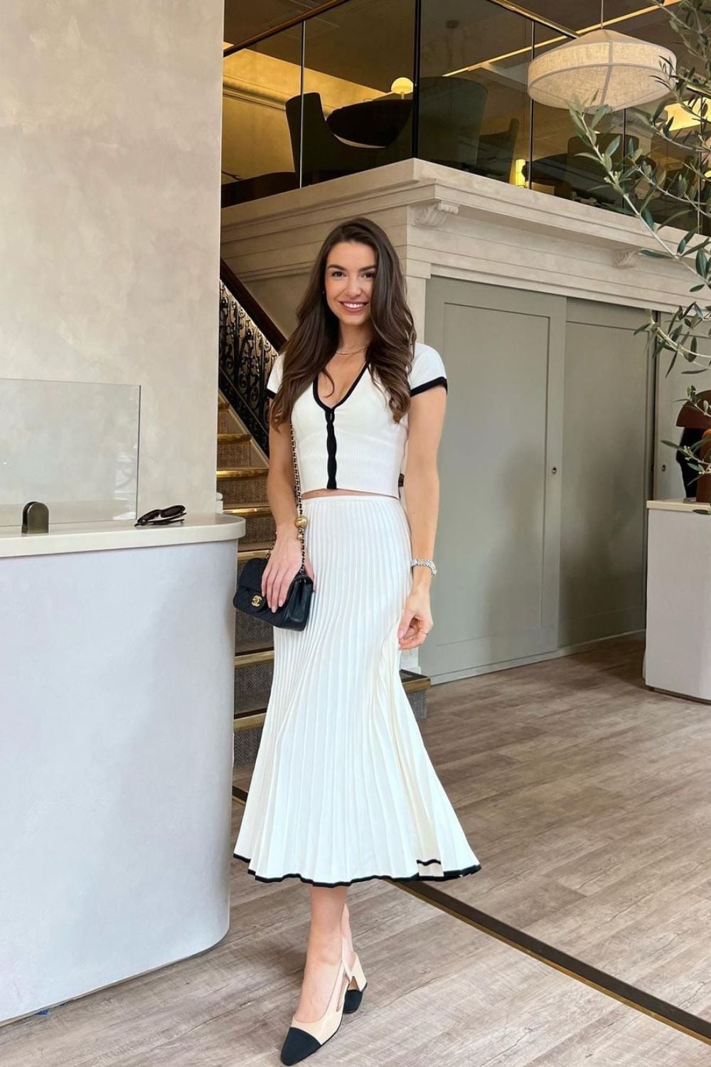 Elegant black and white pleated outfit