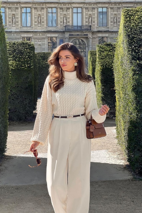 Cream sweater with wide-leg trousers for classic elegance
