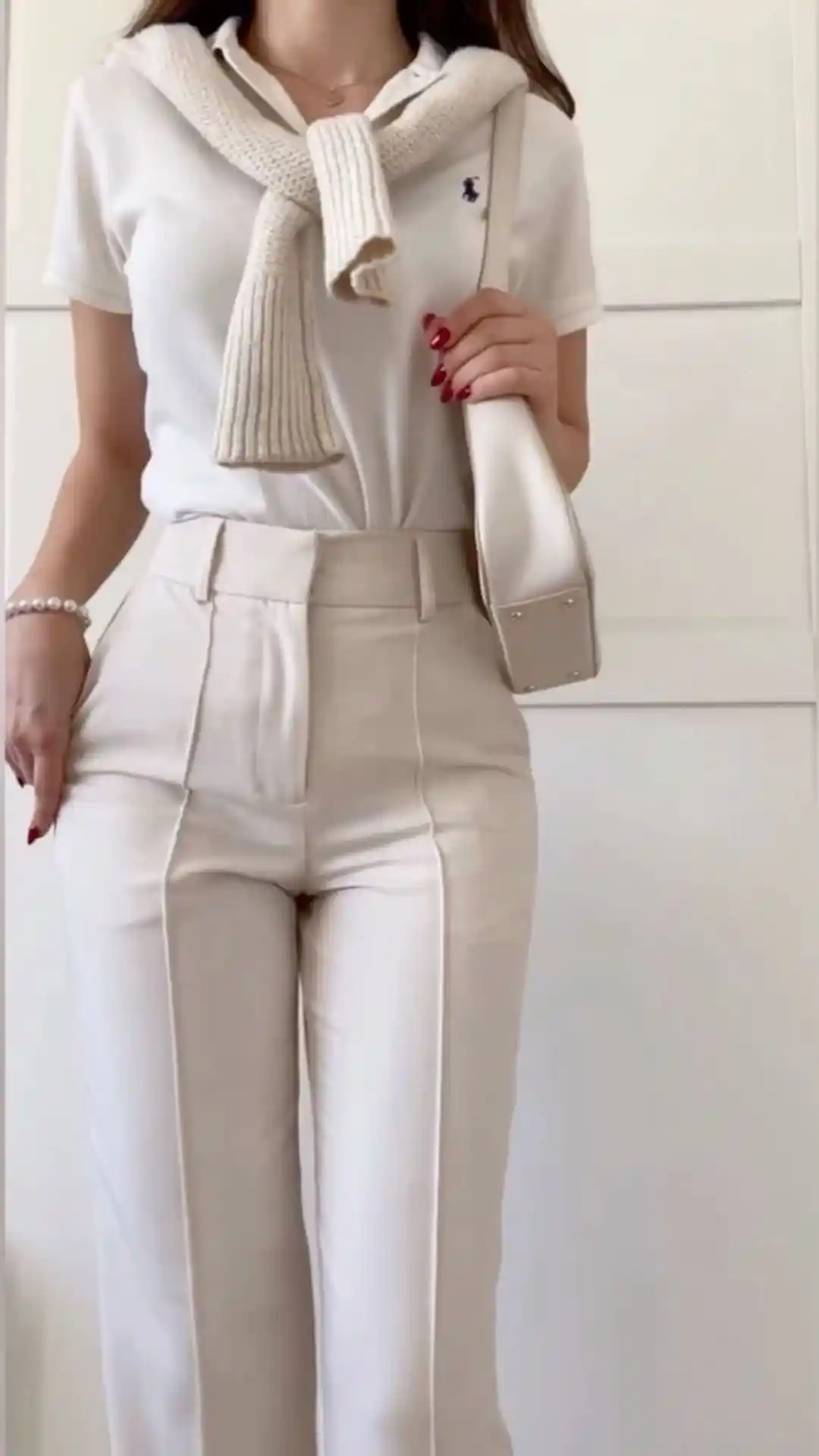 White polo with tailored trousers for timeless style