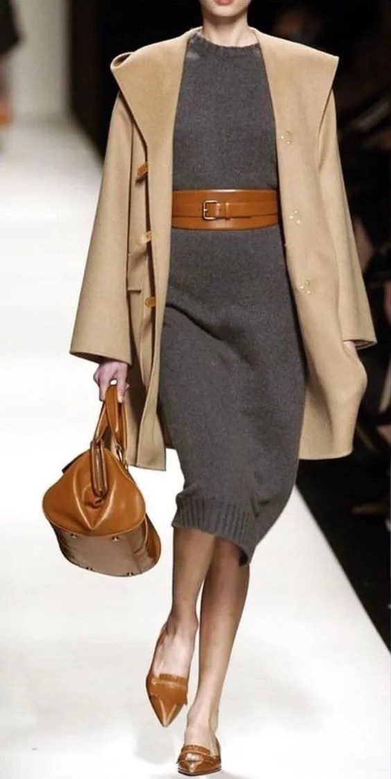 Camel coat over gray dress with belt