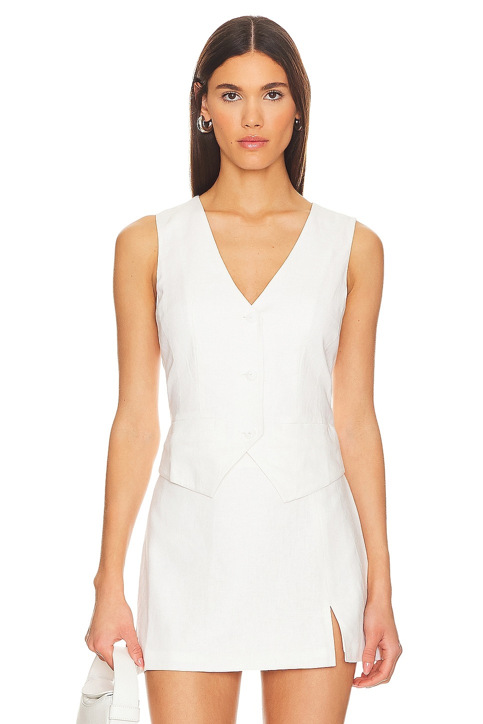 White vest dress with sleek lines