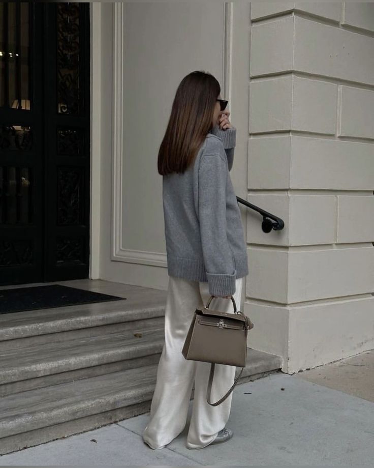 Neutral sweater with wide-leg trousers