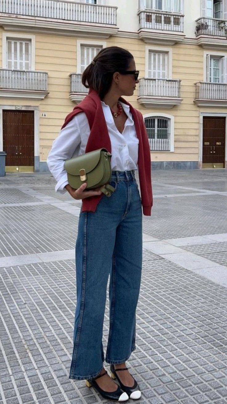 White shirt, jeans, and red sweater