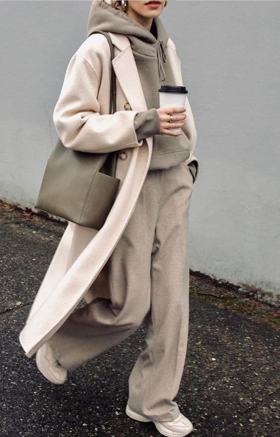 Beige coat, hoodie, and wide-leg pants
