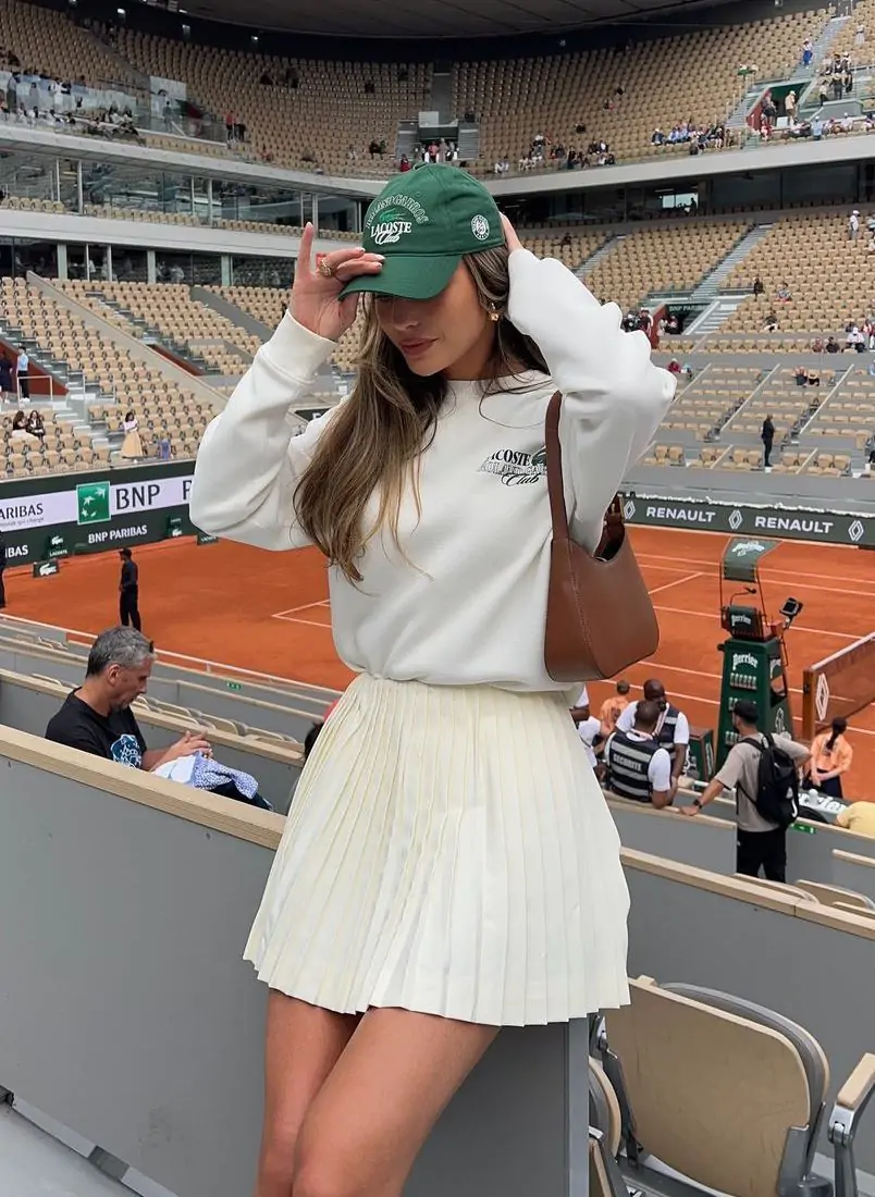 Sporty sweatshirt with pleated skirt, casual school look