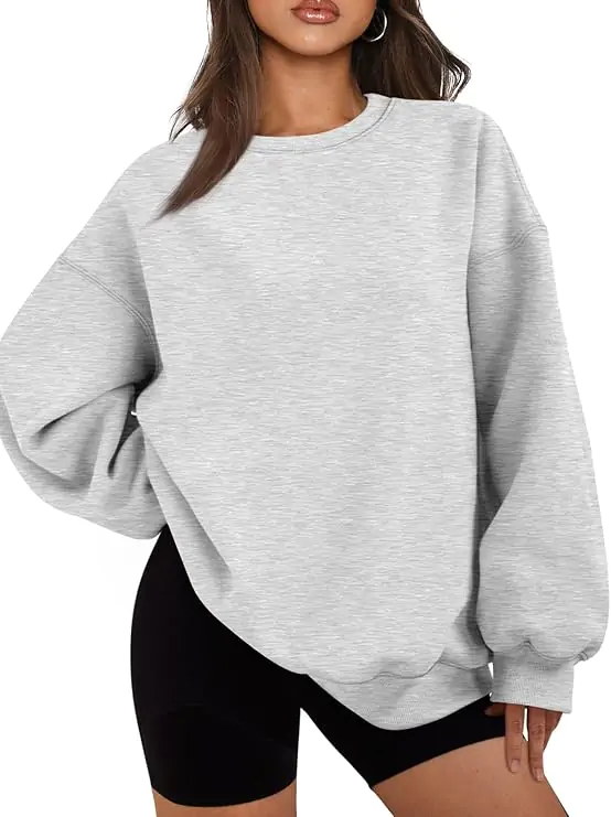 Oversized sweatshirt with biker shorts, sporty school style
