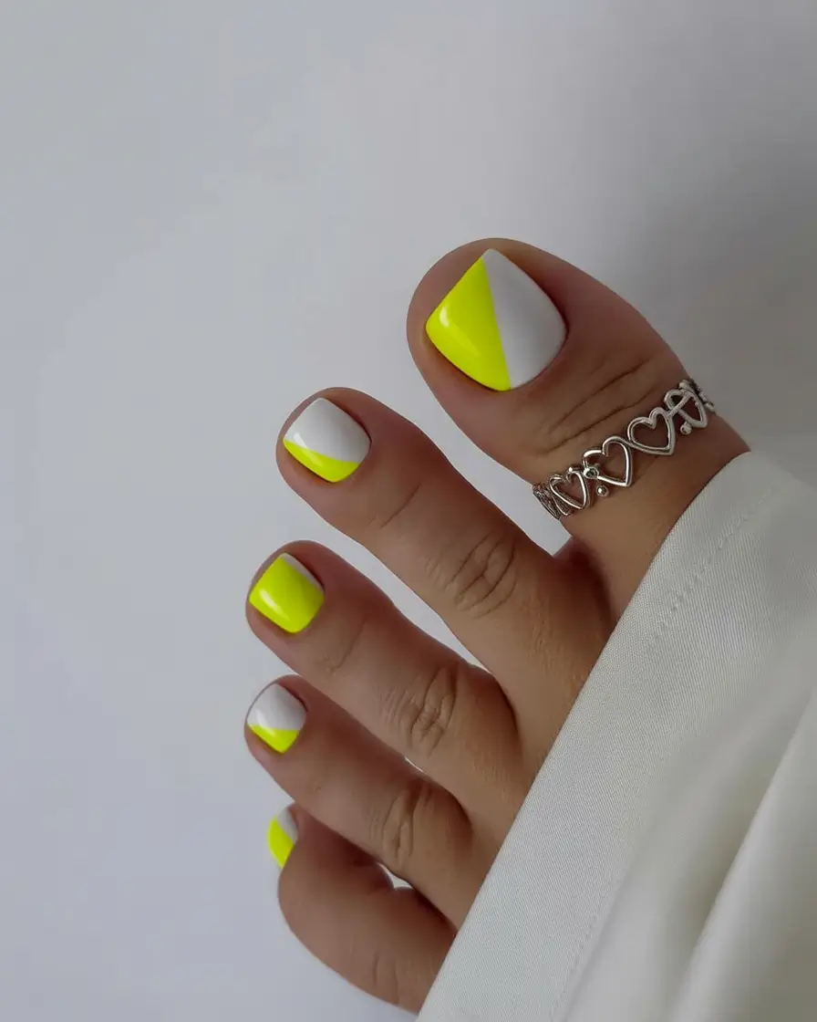 Neon yellow and white geometric pedicure