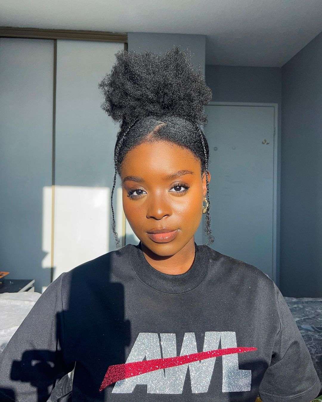 High puff with side tendrils