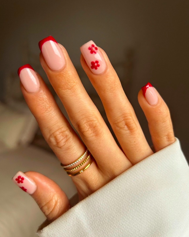 Red French tips with floral accents