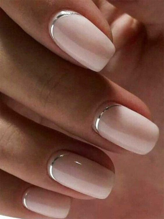 Short nude nails with silver French tips
