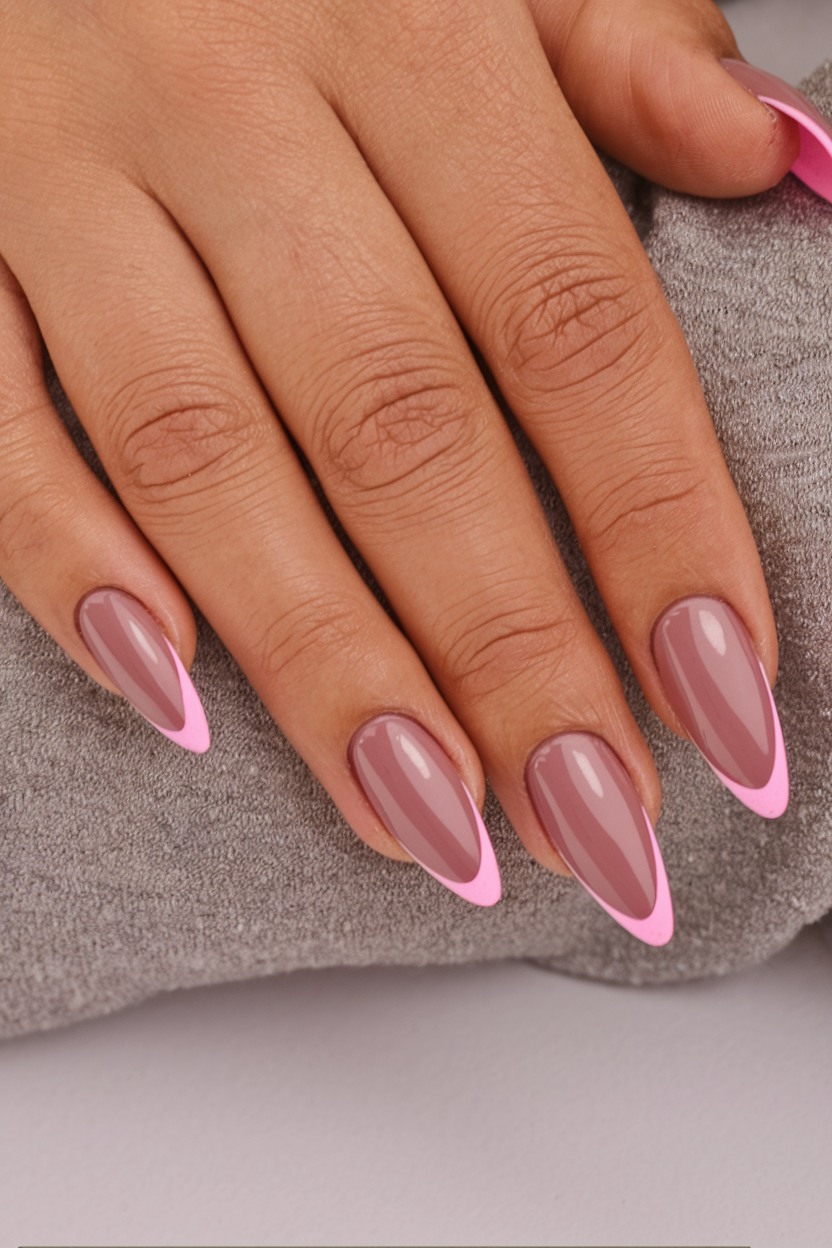 Pink French tip nails with almond shape, modern and chic for Pinterest fashion boards.