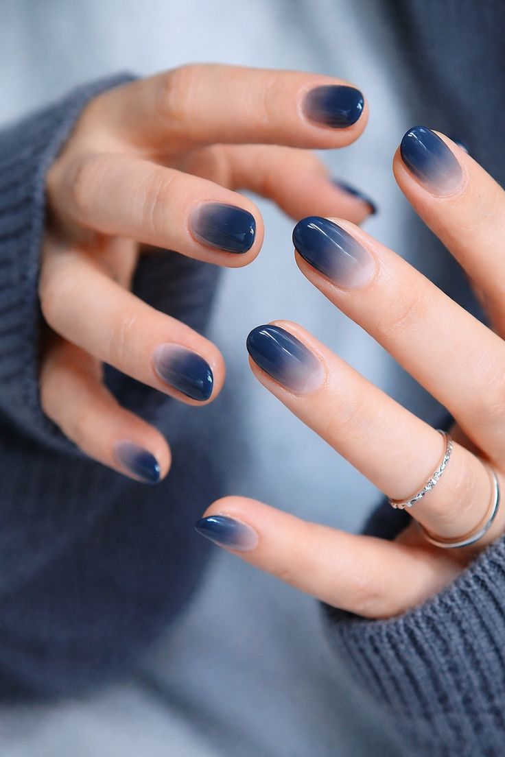 Navy ombré nails, deep and moody, perfect for Pinterest's winter nail trends.