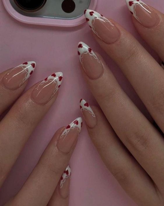Heart-themed French nails, romantic and whimsical.