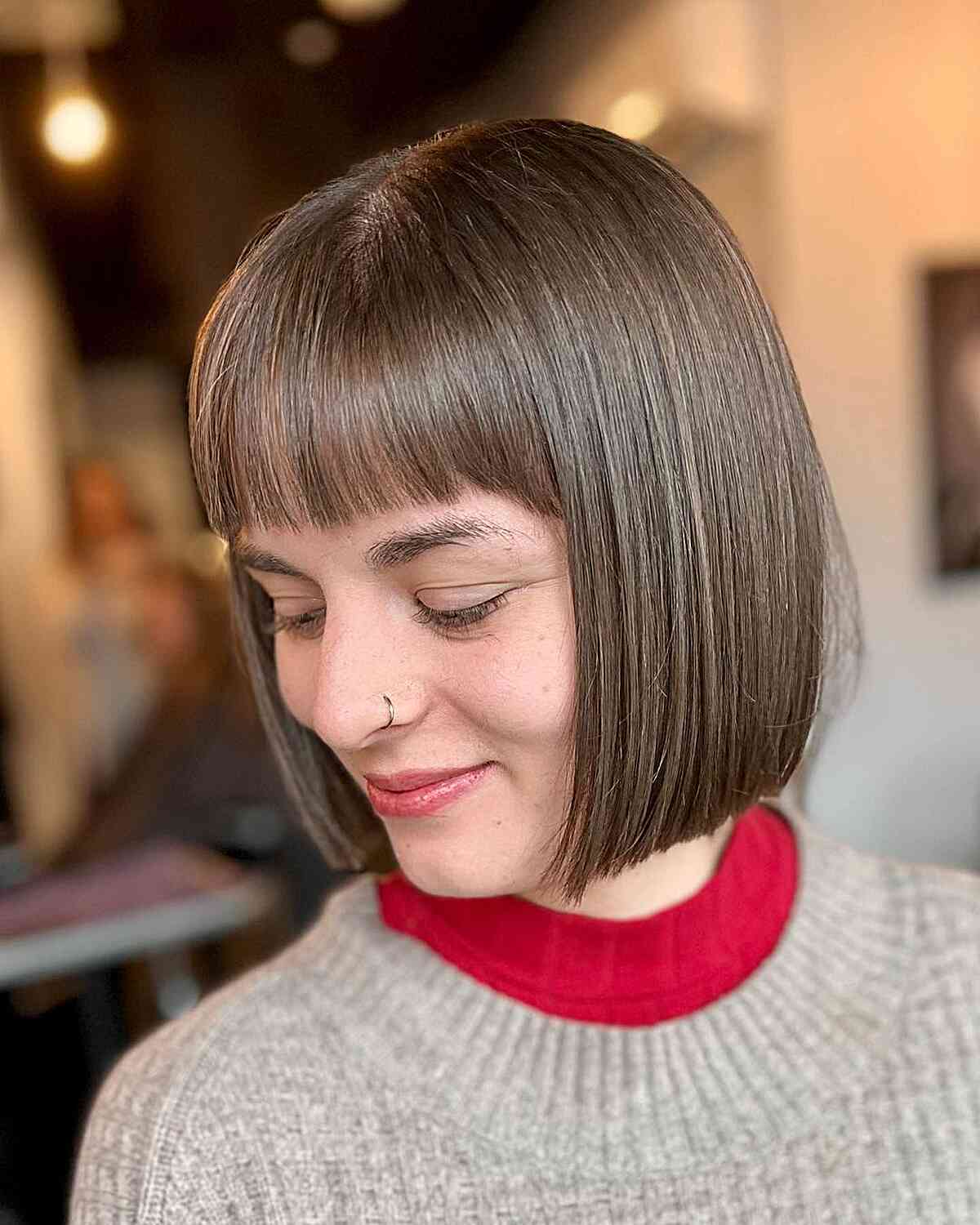 Sleek blunt bob with micro bangs