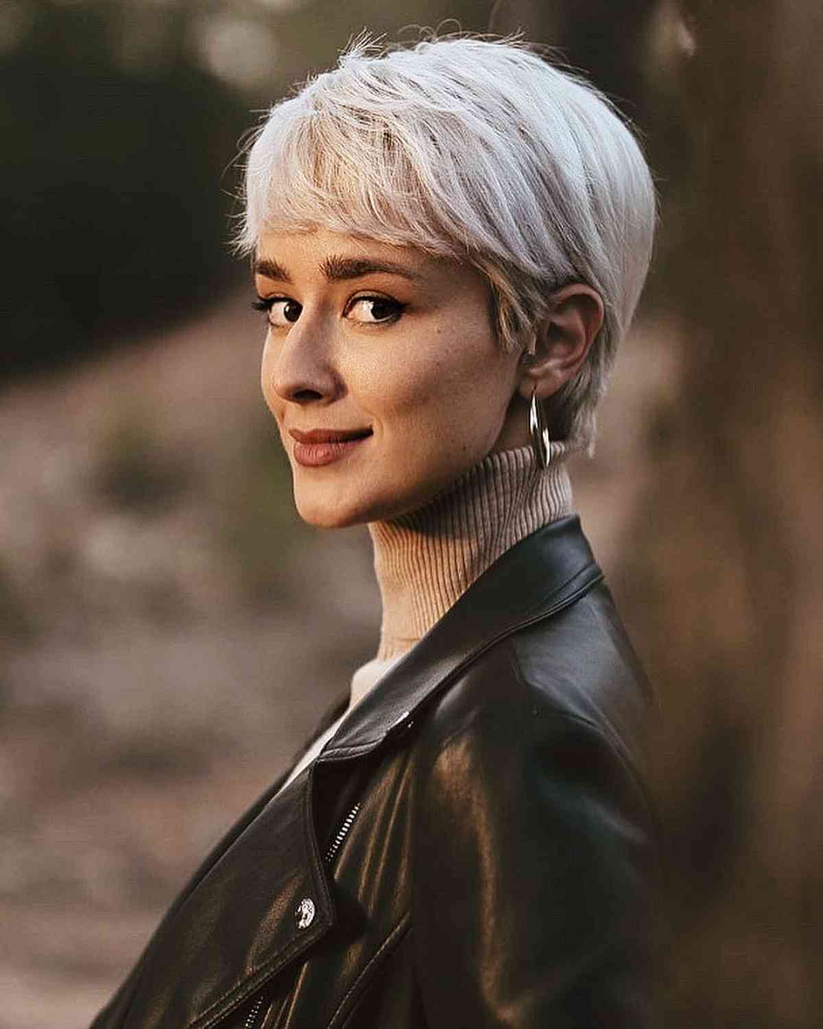 Platinum pixie with side-swept bangs
