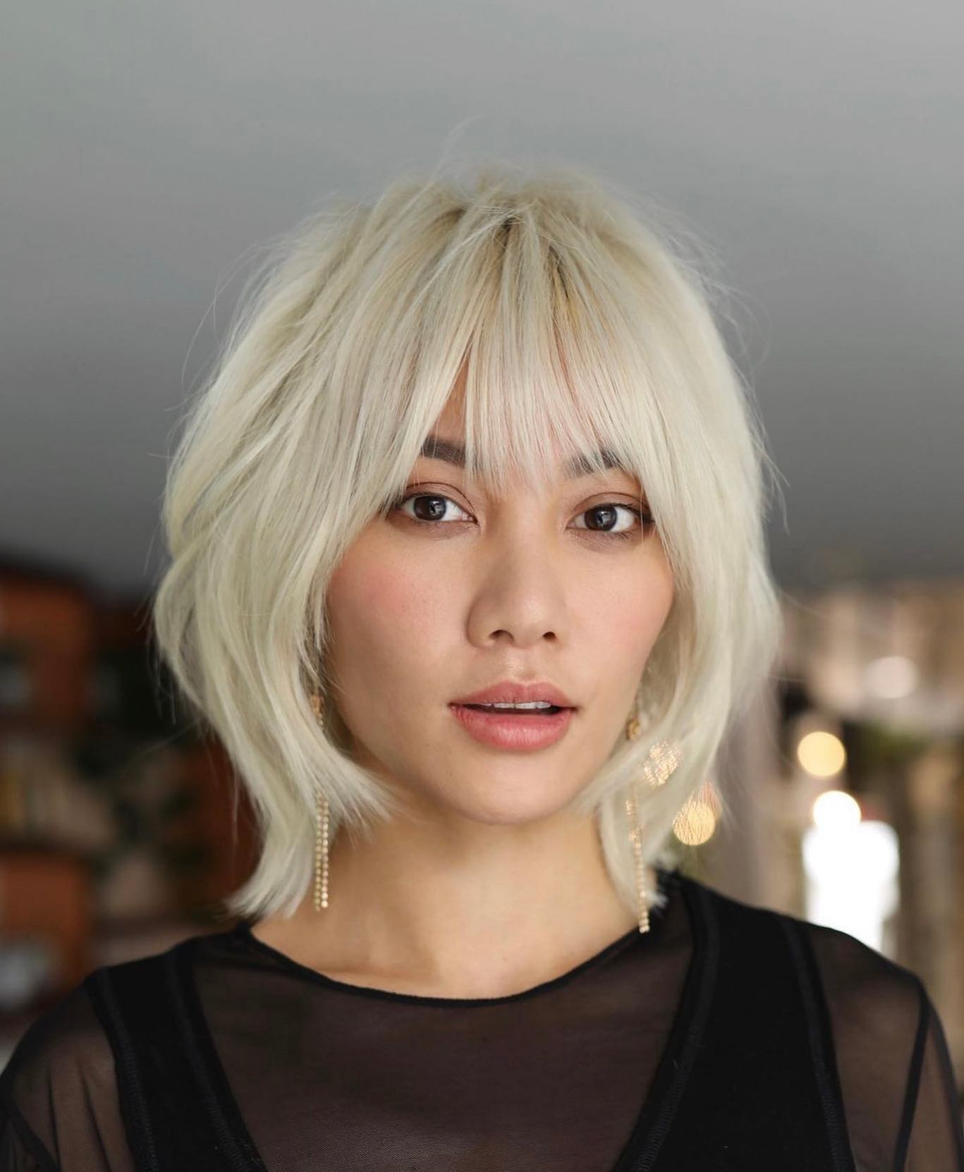 Platinum shag with curtain bangs