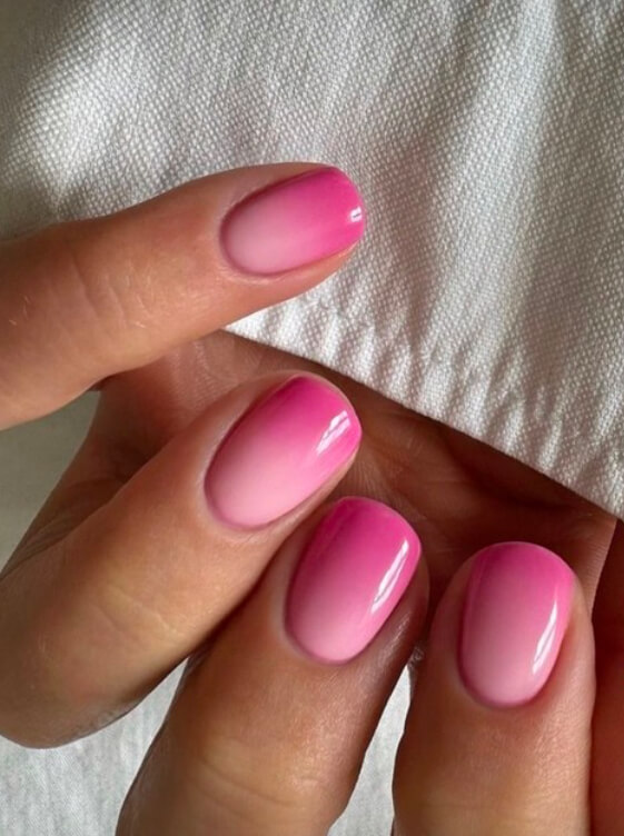 Ombré pink pastel short gel nails with a smooth gradient