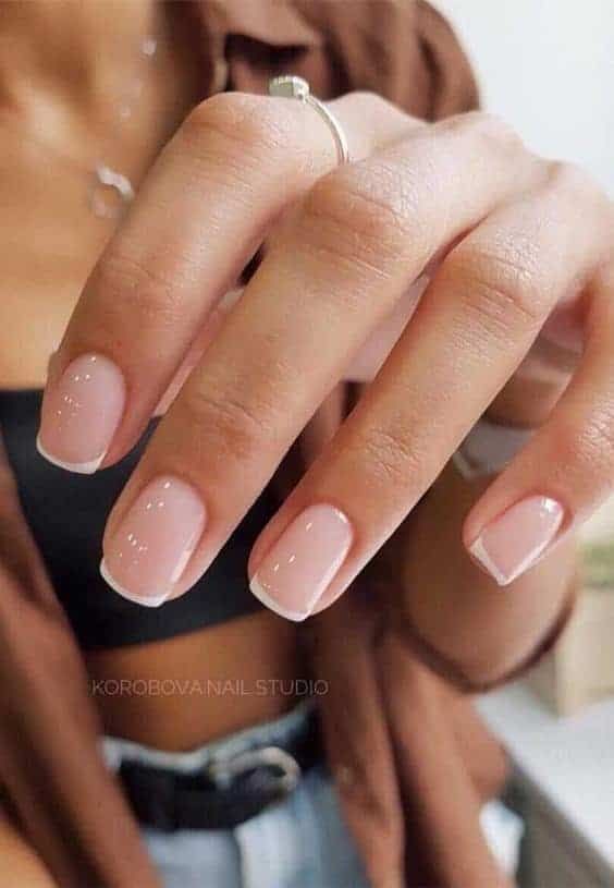 Modern French short square gel nails with a crisp white tip