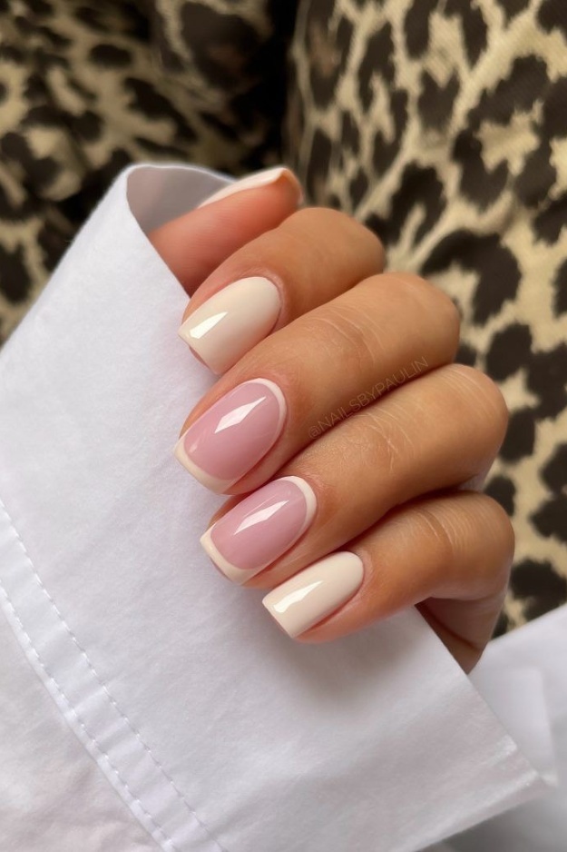 Short square French gel nails with a pink twist