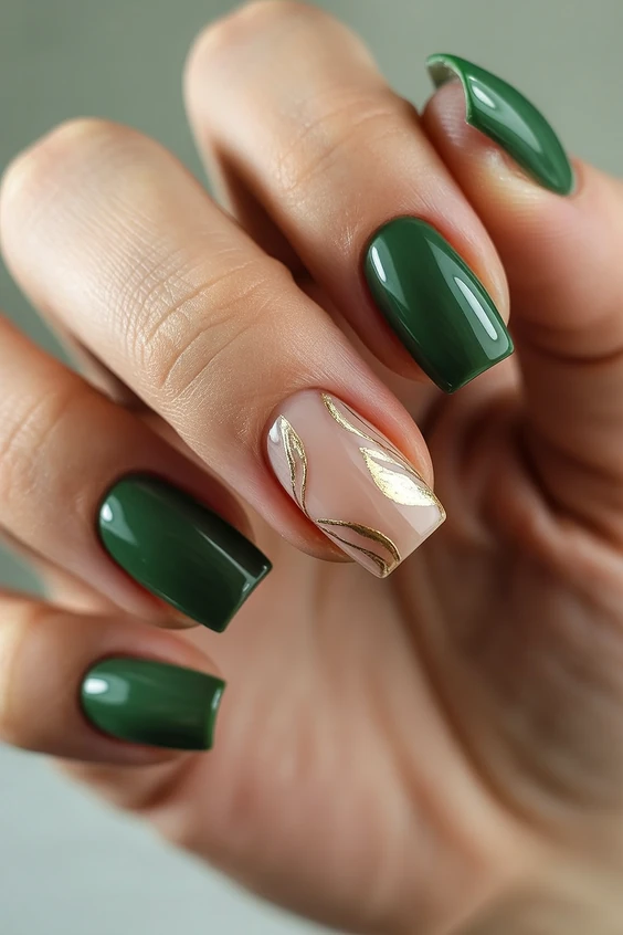 Short square nails with forest green and gold accents, bold and stylish.