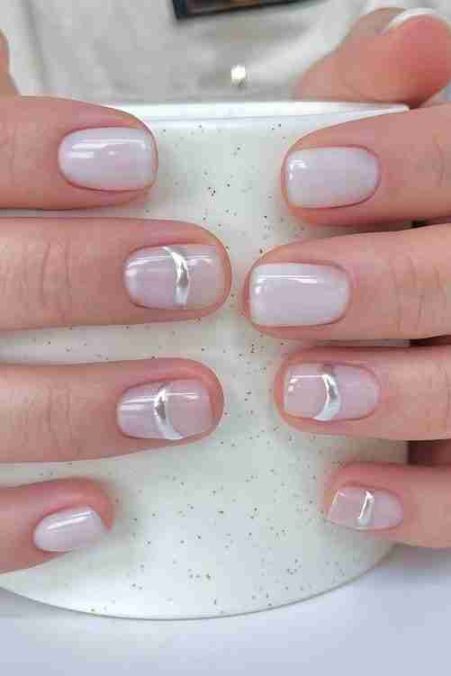 Short square nails with white line accents, minimal and chic.