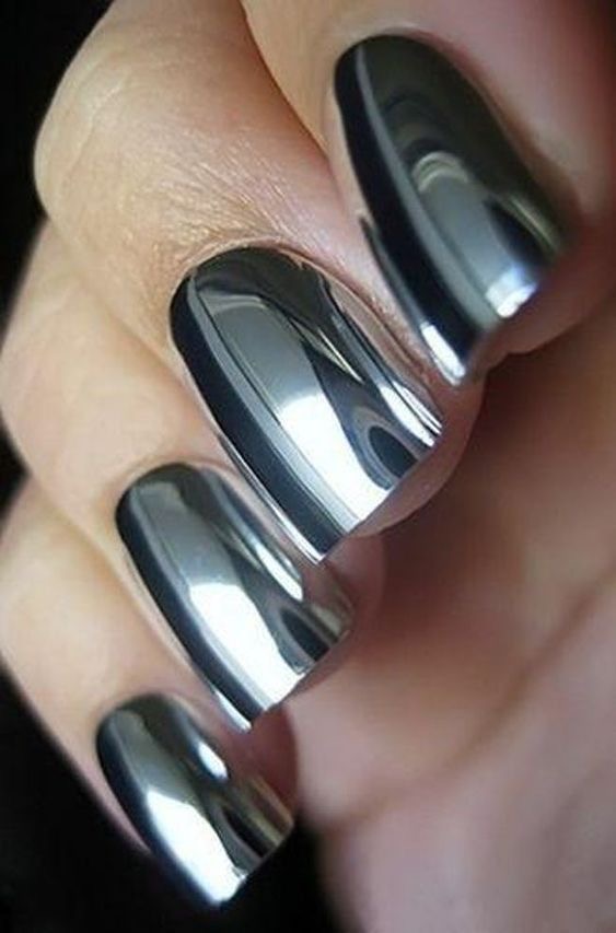 High-shine chrome nails, bold and reflective manicure