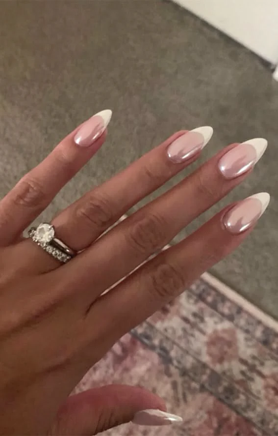 Almond nails with silver French tips, classic yet modern manicure