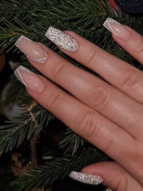 Coffin nails with silver glitter accents, festive nail design