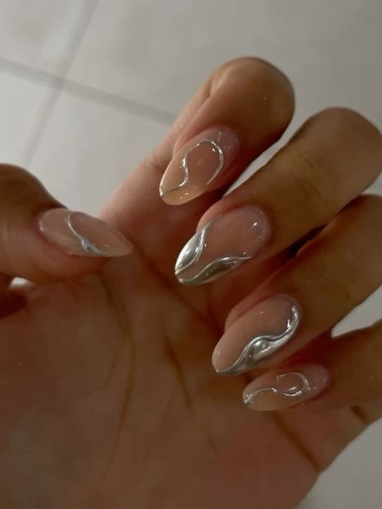 Coffin nails with abstract silver waves, artistic nail art