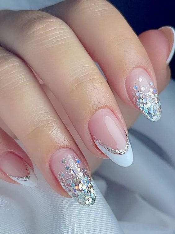 Almond nails with glitter and French tips, festive nail art