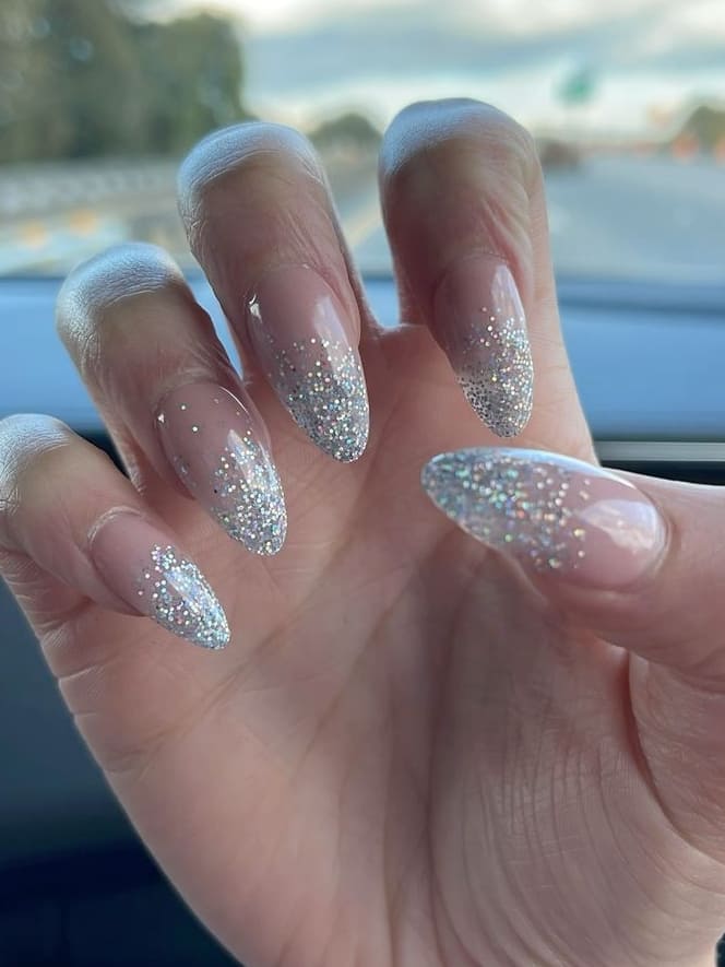 Almond nails with silver glitter ombré, chic nail art