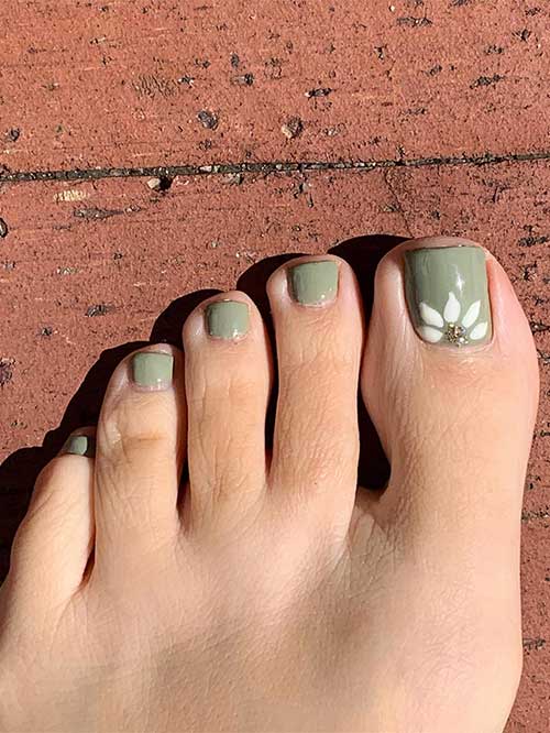 Olive green toe nails with white floral accent